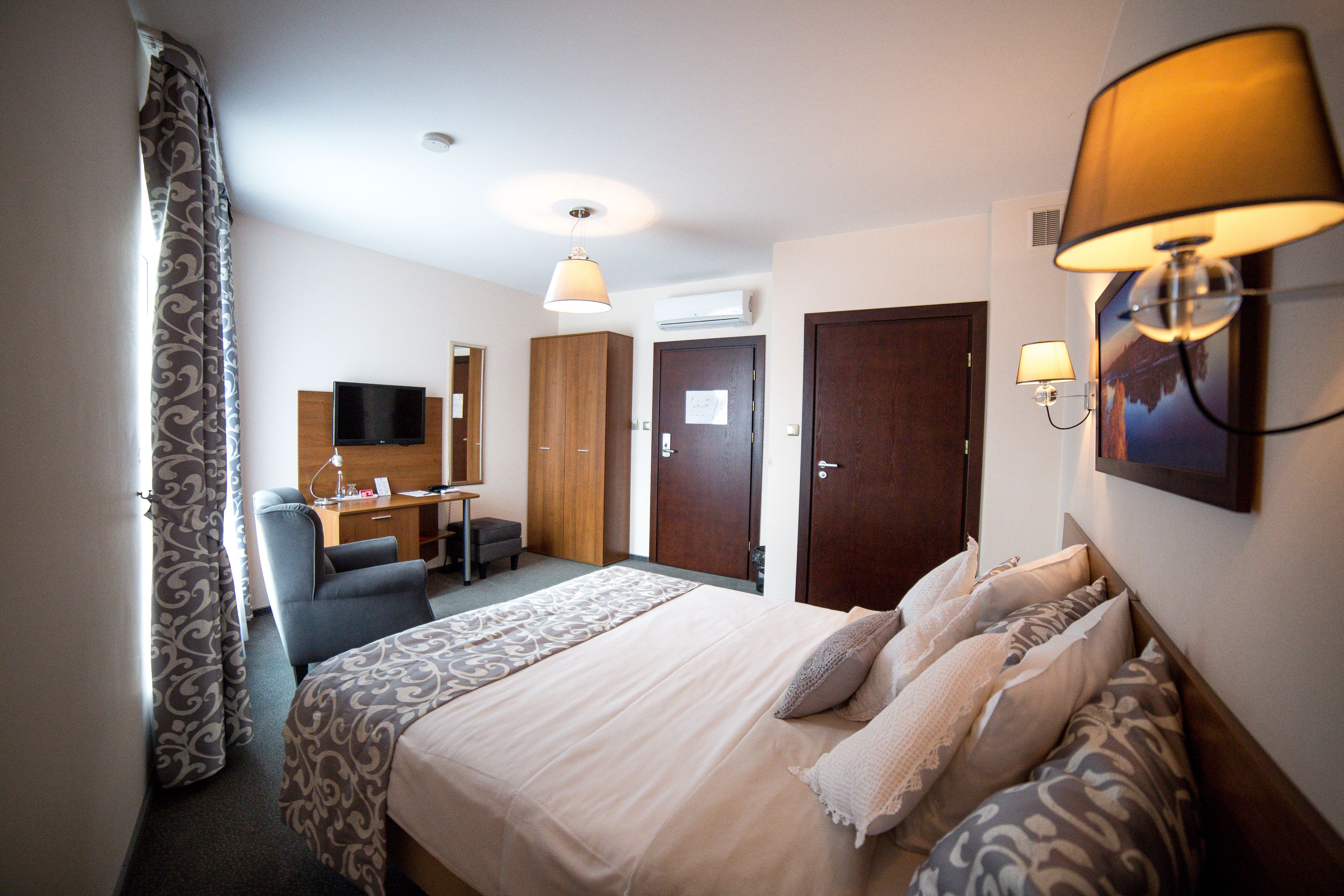 comfort double room | in-room safe, individually decorated, desk, laptop workspace