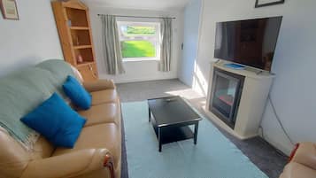 Apartment, 2 Bedrooms (Meadow View) | Living area | LCD TV