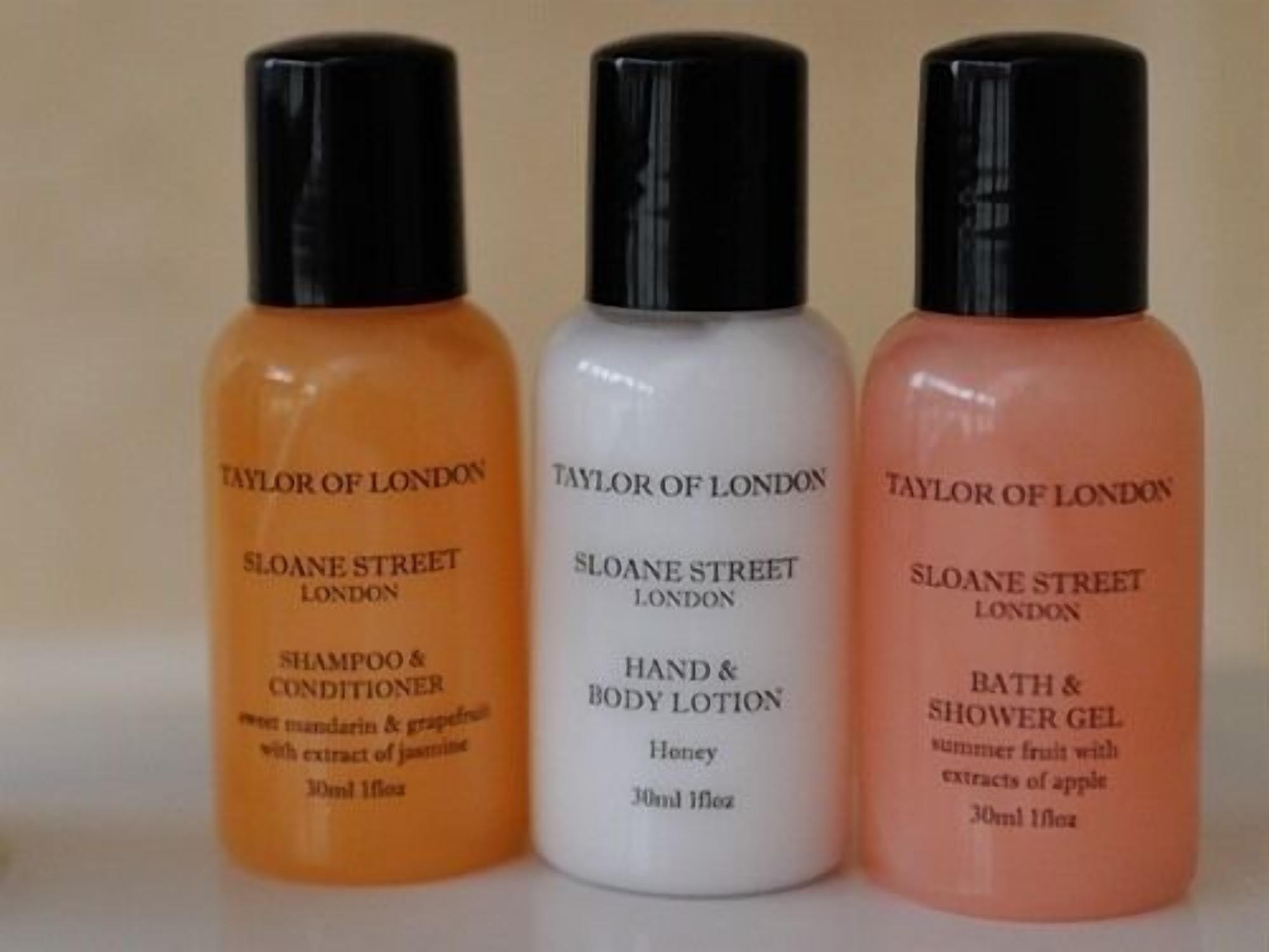 Three bottles of Taylor of London products: shampoo & conditioner, hand & body lotion, and bath & shower gel.