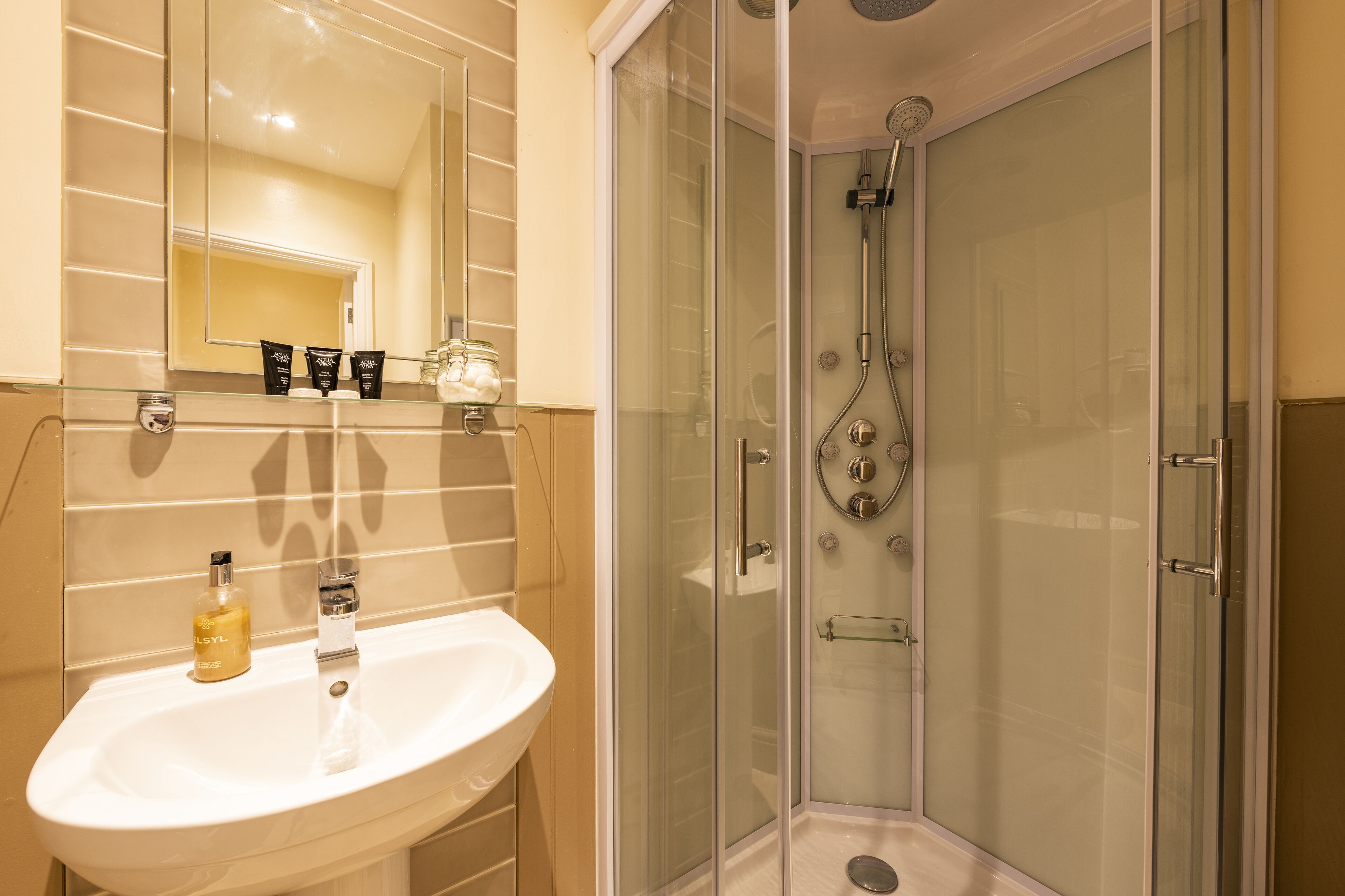 superior triple room (room 2 1st floor) | bathroom | shower, hair dryer, towels, soap