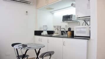 Fridge, microwave, stovetop, coffee/tea maker
