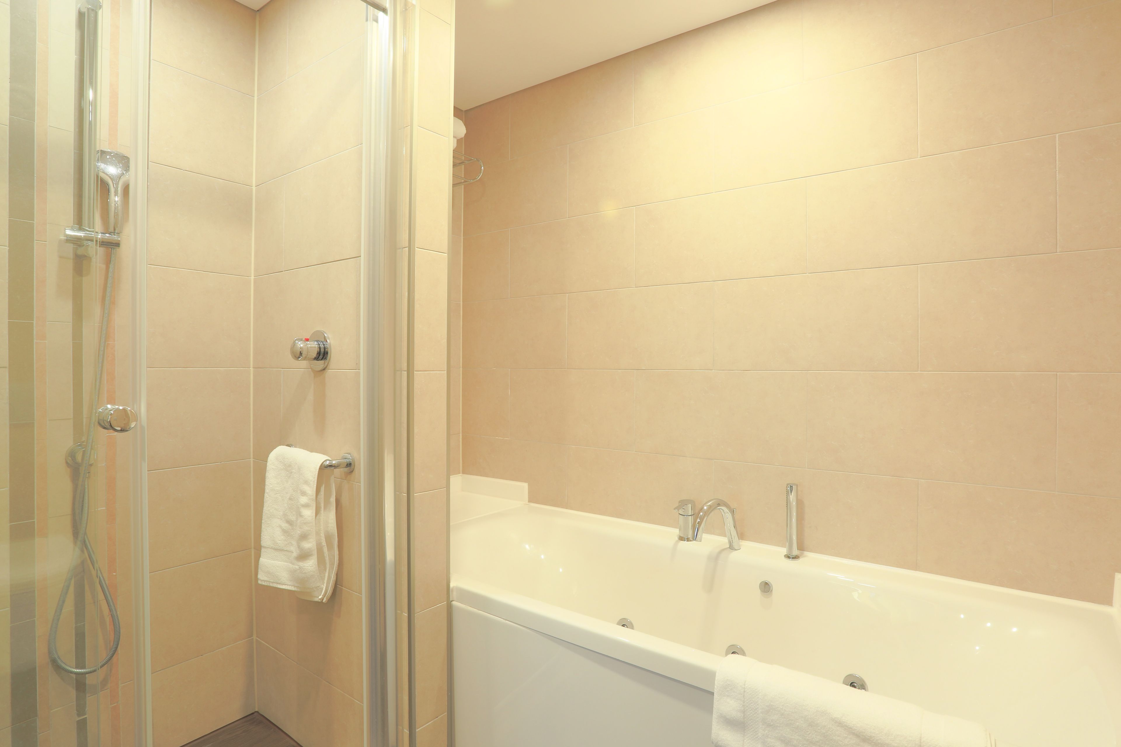 king, suite, 1 bedroom | bathroom | free toiletries, hair dryer, slippers, towels