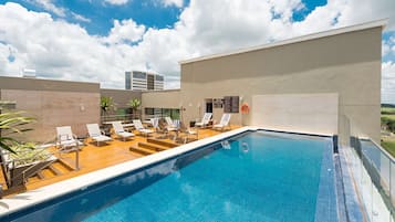 Outdoor pool, open 6:00 AM to 10:00 PM, sun loungers