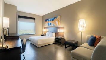 Room, 1 King Bed, Accessible (Roll-In Shower) | Minibar, in-room safe, desk, laptop workspace