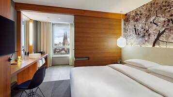 Room, 1 King Bed, City View | 1 bedroom, hypo-allergenic bedding, in-room safe, desk