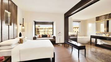 Premium bedding, down duvets, memory-foam beds, minibar