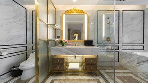 Separate tub and shower, free toiletries, hair dryer, bathrobes