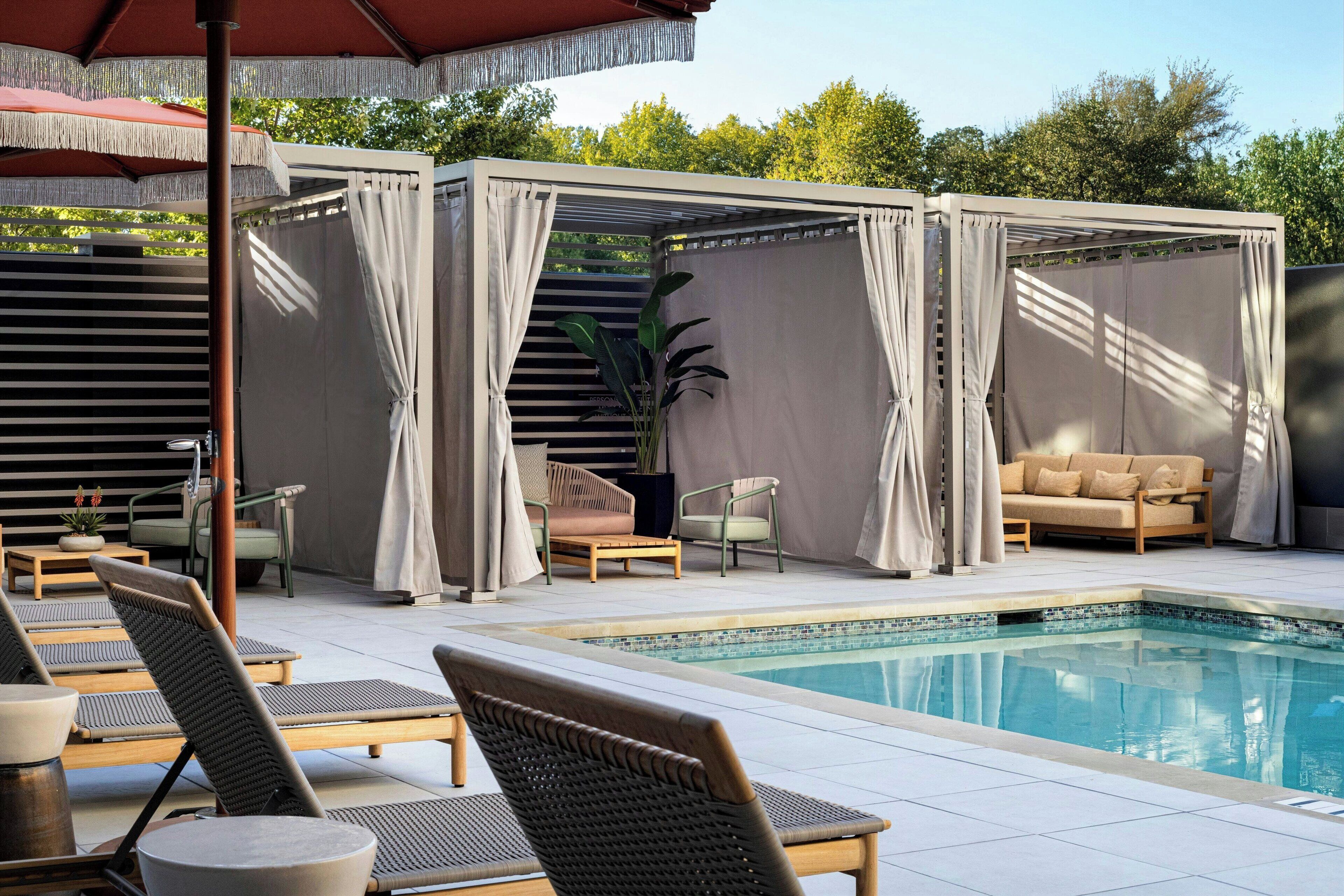 Outdoor pool, open 7:00 AM to 9:00 PM, pool loungers