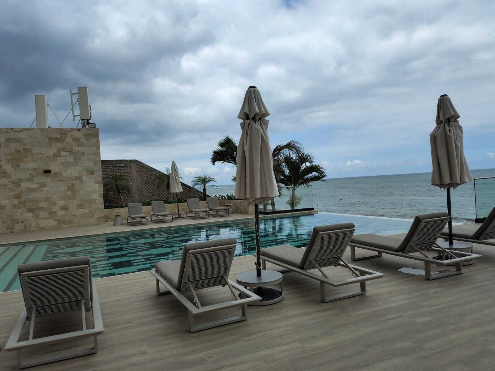 2 outdoor pools, pool umbrellas, sun loungers