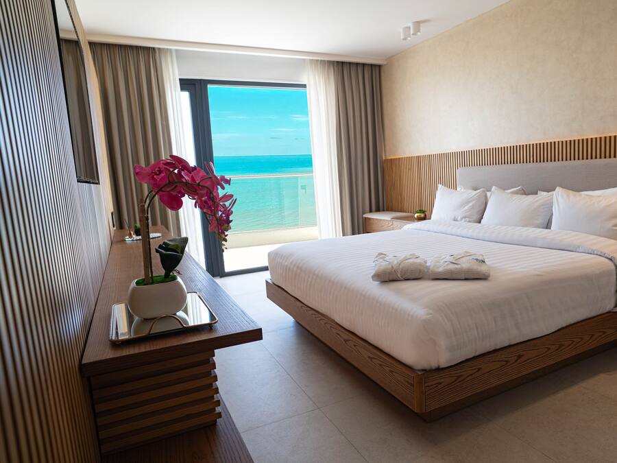 Deluxe Room, 1 Queen Bed, Balcony, Sea View | In-room safe, desk, laptop workspace, soundproofing