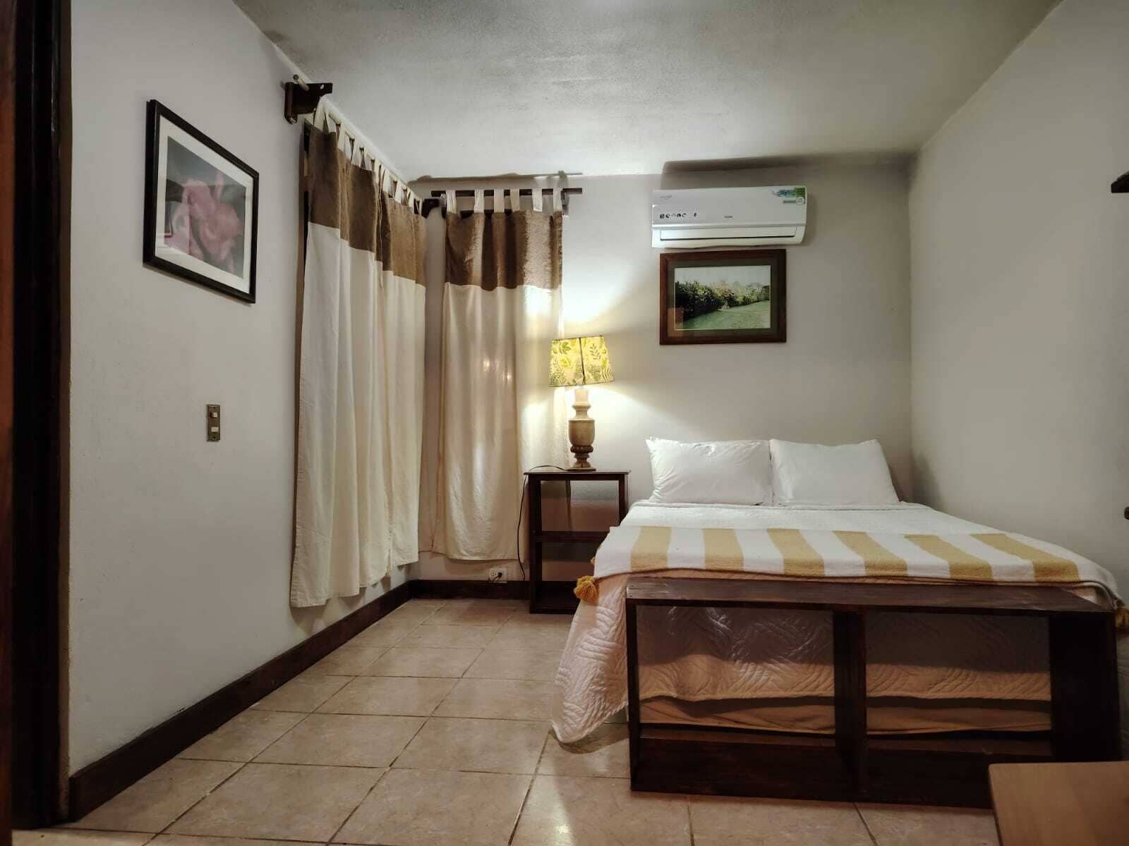 Premium bedding, pillow-top beds, desk, laptop workspace