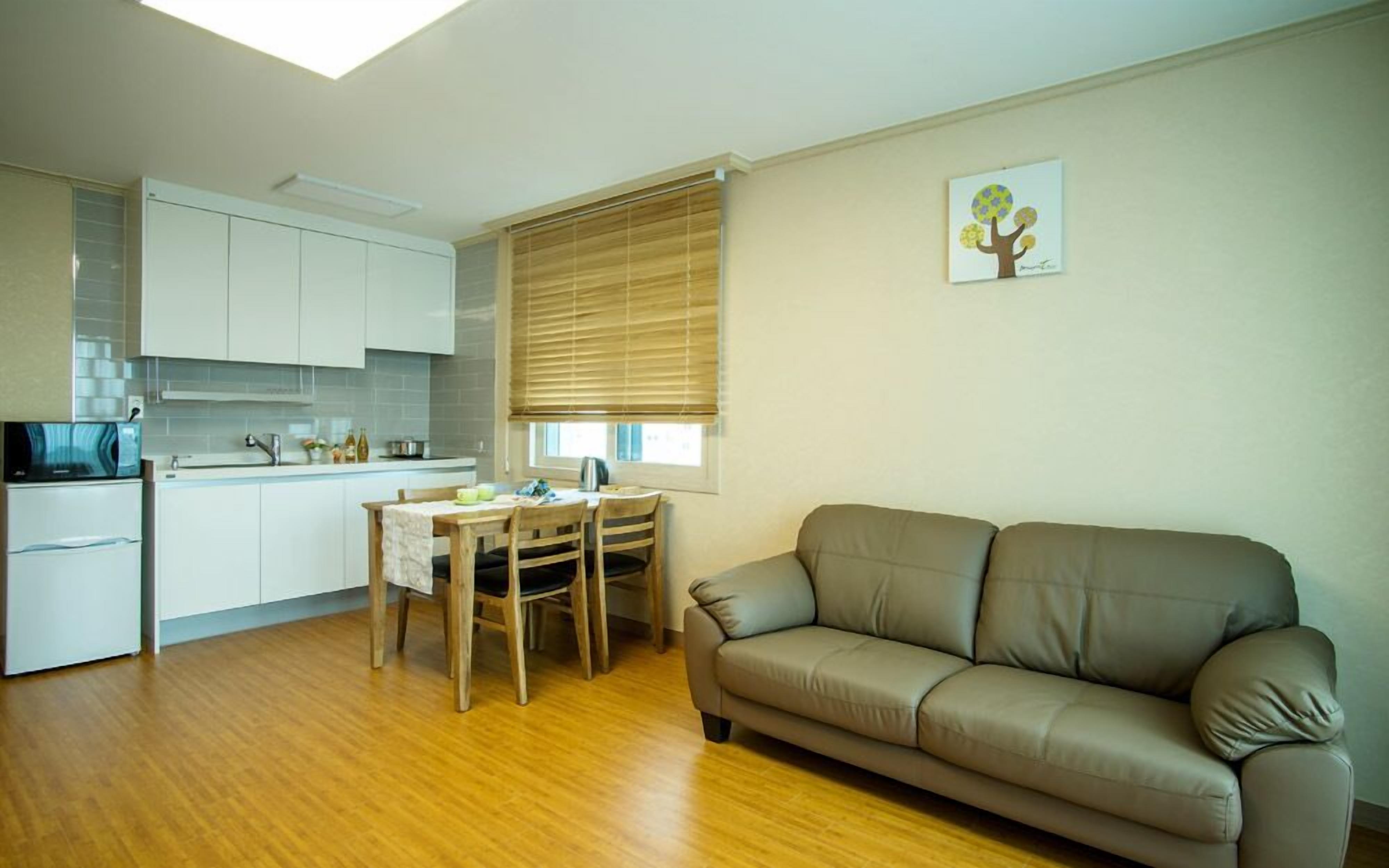 family room, 1 bedroom, kitchenette, partial sea view | living area | 40-inch flat-screen tv with cable channels, tv, pay films