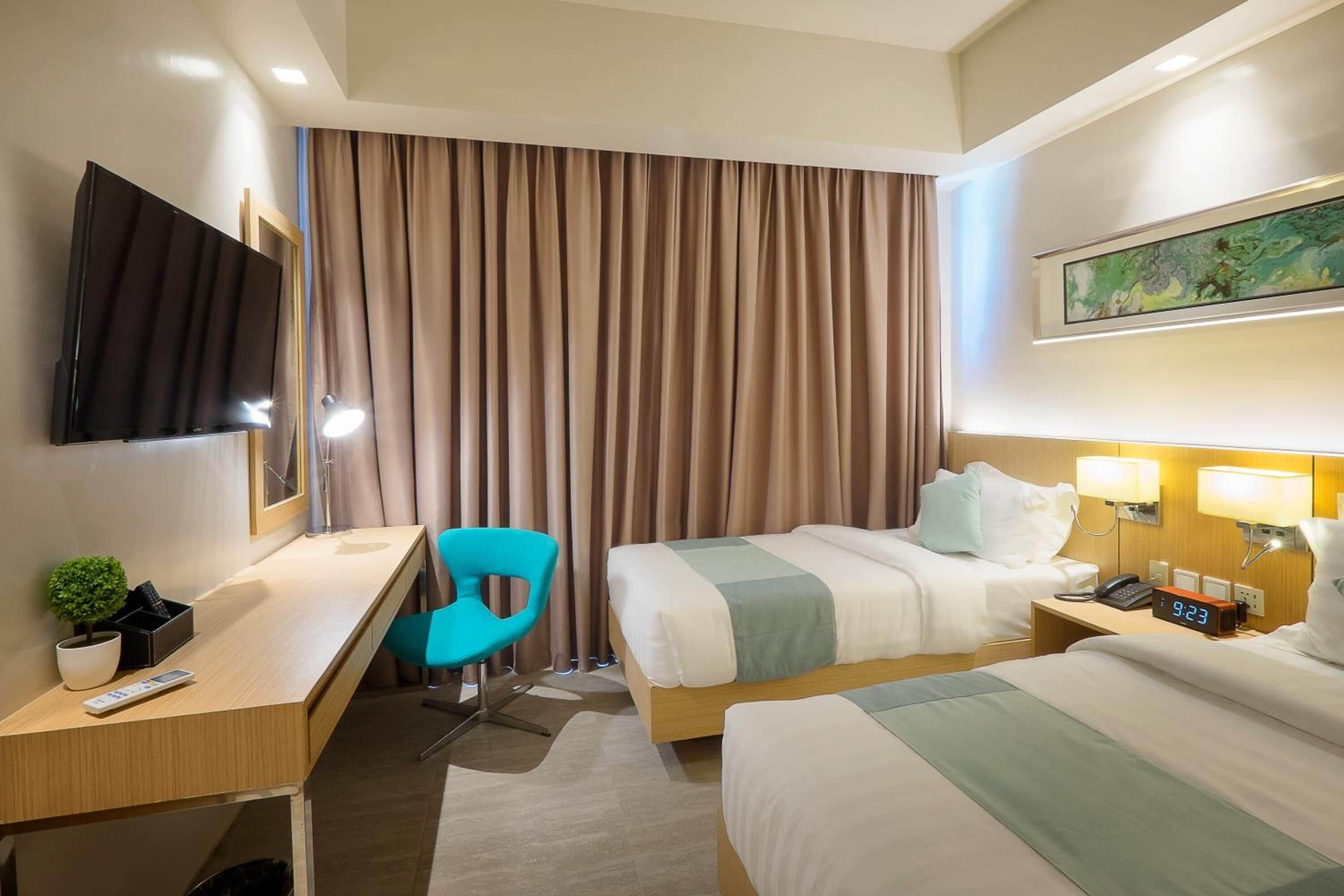 premium bedding, pillow-top beds, in-room safe, individually decorated