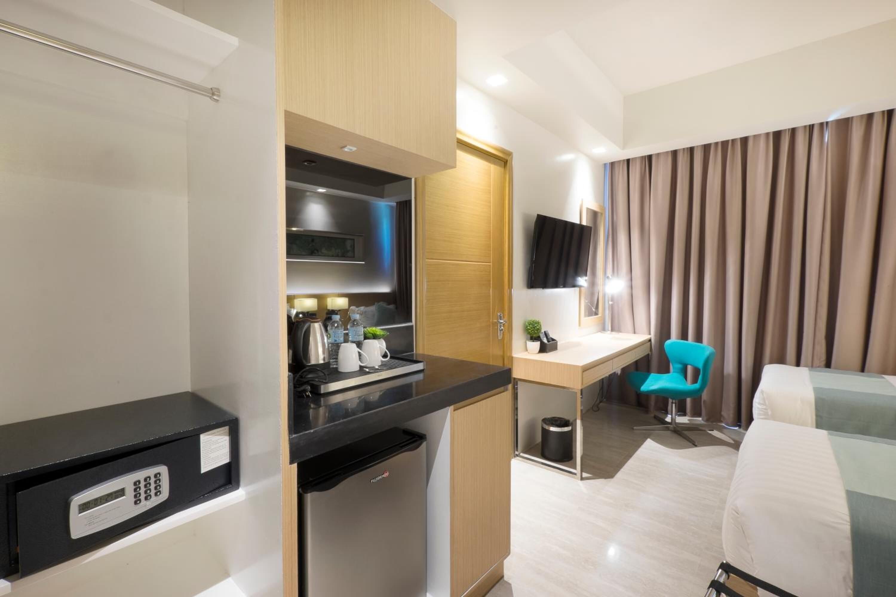 premium bedding, pillow-top beds, in-room safe, individually decorated