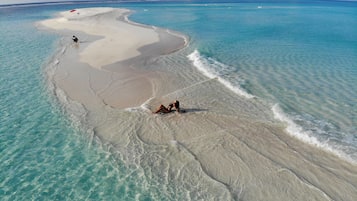 Private beach, white sand, snorkeling, water skiing