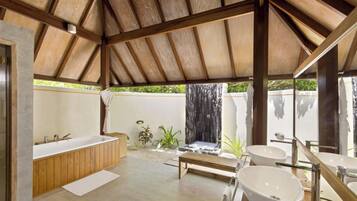 Separate tub and shower, rainfall showerhead, designer toiletries