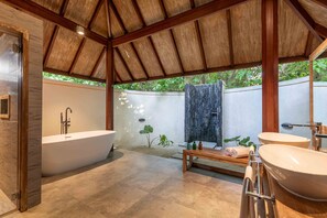 Semi Water Villa | Bathroom | Separate bathtub and shower, rainfall showerhead, designer toiletries