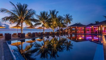 Outdoor pool, open 6:00 AM to 6:30 PM, free pool cabanas, pool umbrellas