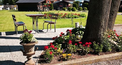 Milano Garden - City Bungalow Hotell, i grÀnssnittet till Kullabygdens pÀrlor