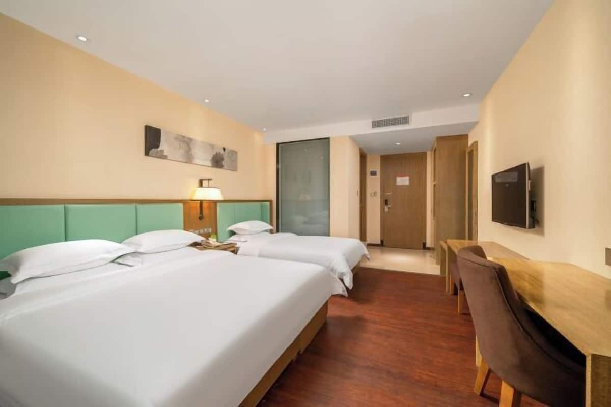 Ropa de cama de alta calidad, edredón y minibar 