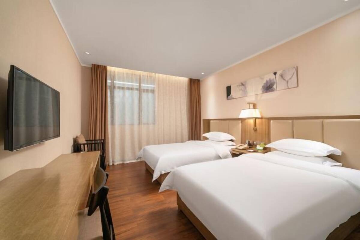Ropa de cama de alta calidad, edredón y minibar 