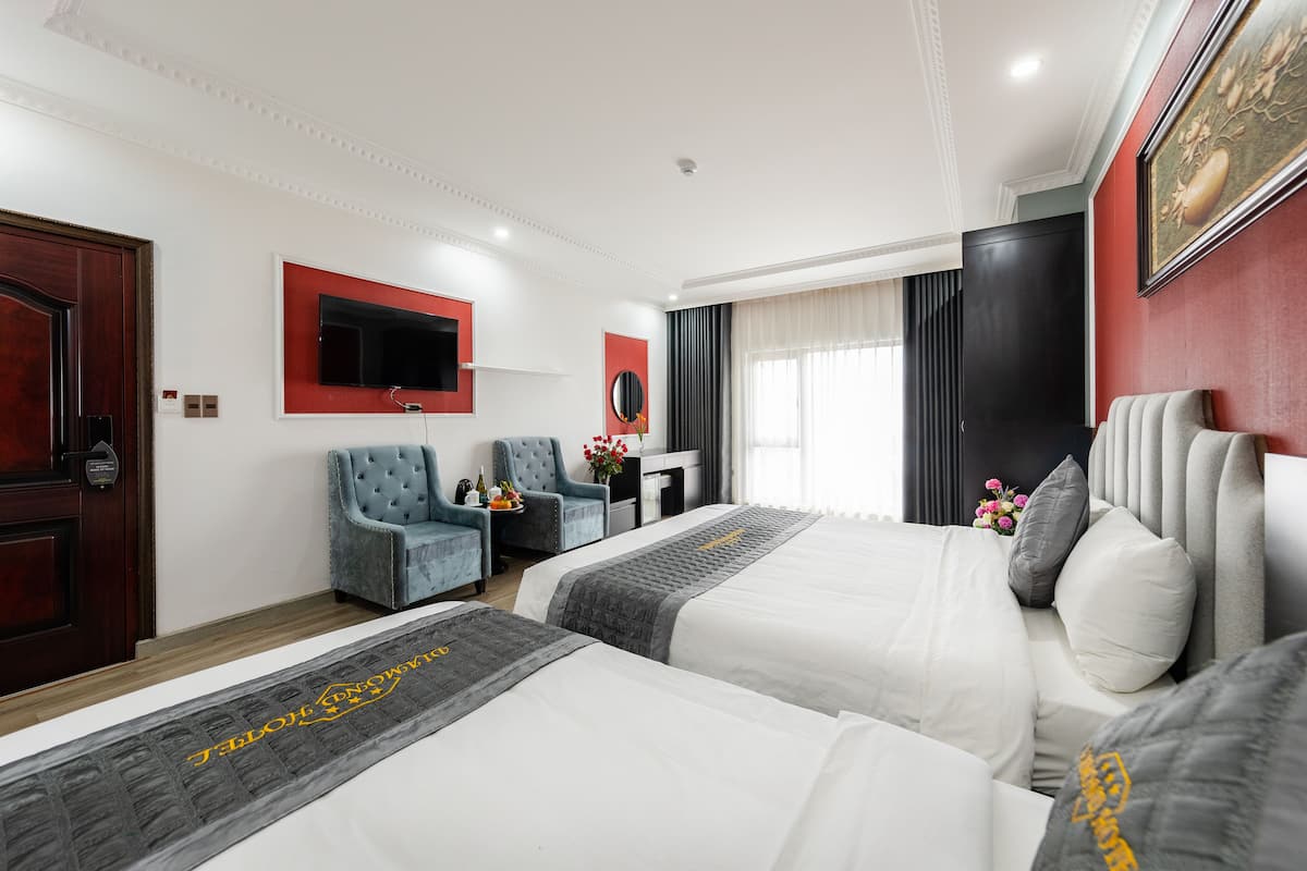 Deluxe driepersoonskamer | Een minibar, individueel gedecoreerd, individueel gemeubileerd