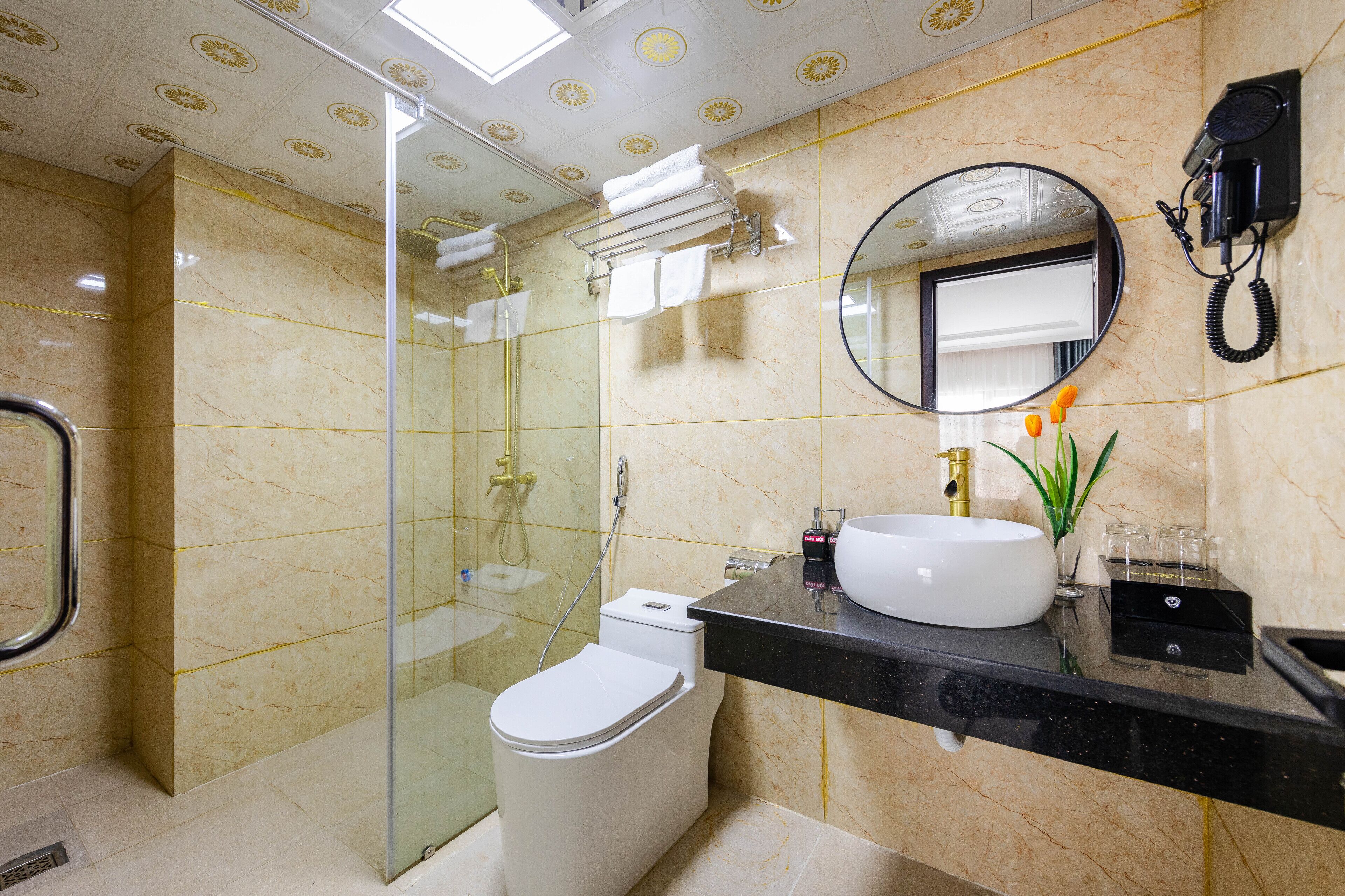 shower, free toiletries, hair dryer, slippers