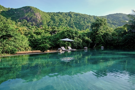 Outdoor pool, pool umbrellas, sun loungers