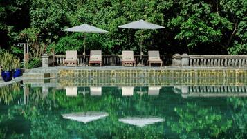 Outdoor pool, pool umbrellas, sun loungers
