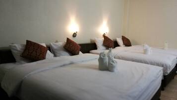 Family Room | Premium bedding, desk, blackout drapes, free WiFi