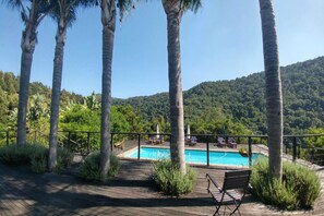 Indoor pool, outdoor pool, pool umbrellas, pool loungers - Shangri-La Manor - Adults Only (Wilderness)