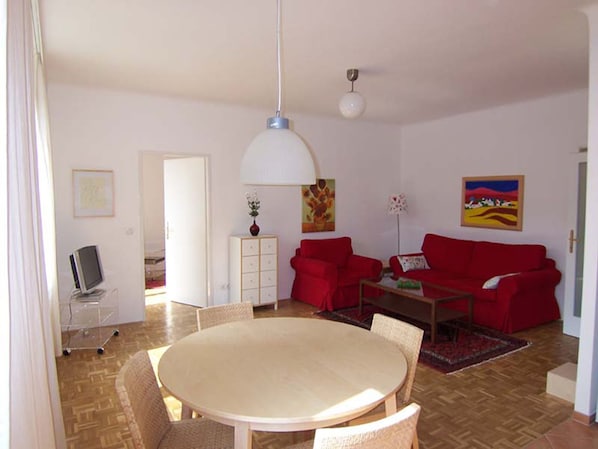 Standard Apartment, Non Smoking, Garden Area | Living room | Flat-screen TV