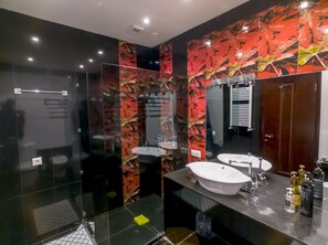 A modern bathroom with a glass shower enclosure, two sinks, and a large mirror. - Tbilisi Core: Leo (Tbilisi)