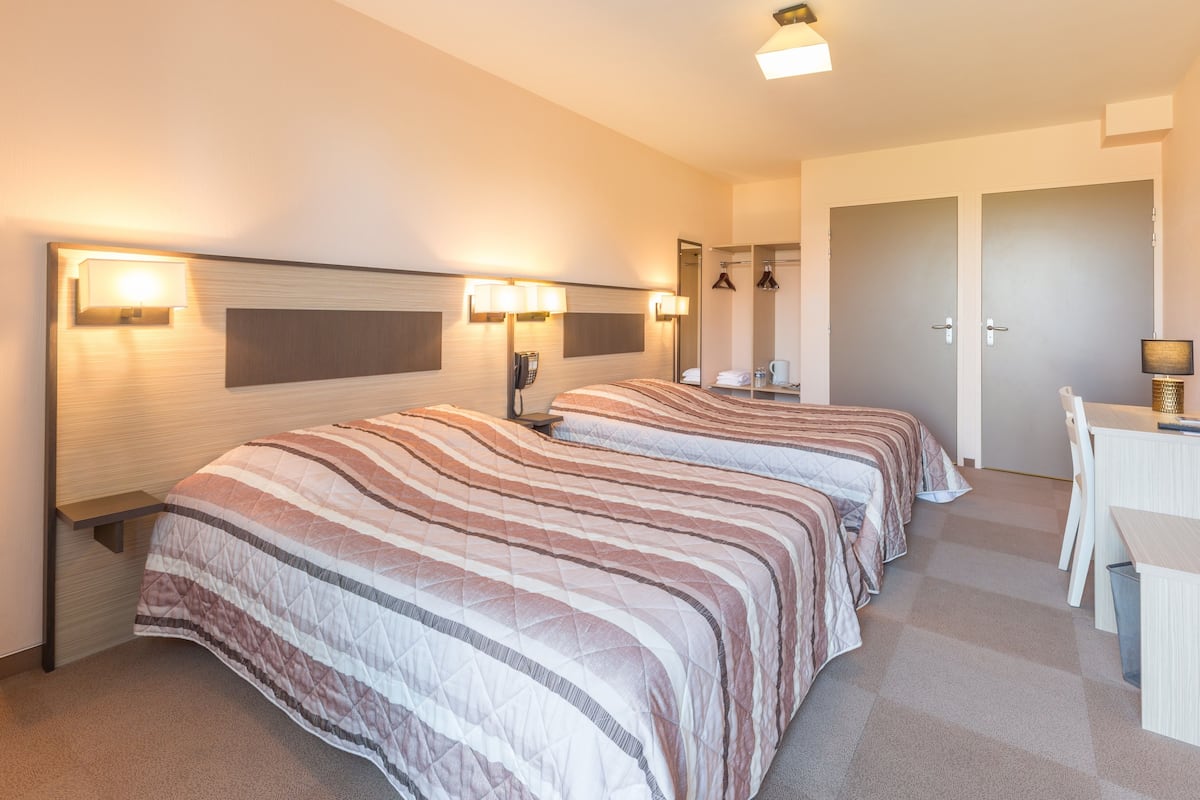 family room, garden area | premium bedding, desk, soundproofing, iron/ironing board