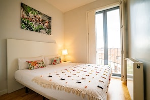 Apartamento, 2 quartos (1 person) | Wi-Fi de cortesia, roupa de cama