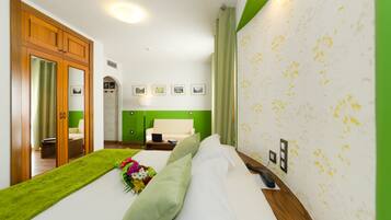 Standard Double Room | Minibar, in-room safe, desk, blackout drapes