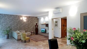 Superior Apartment, 3 Bedrooms | Living room | 26-inch TV with digital channels