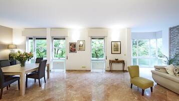 Superior Apartment, 3 Bedrooms | Living area | 26-inch TV with digital channels