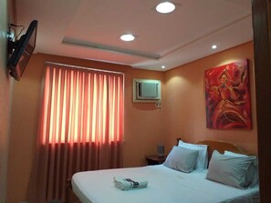 Desk, blackout curtains, rollaway beds, free WiFi