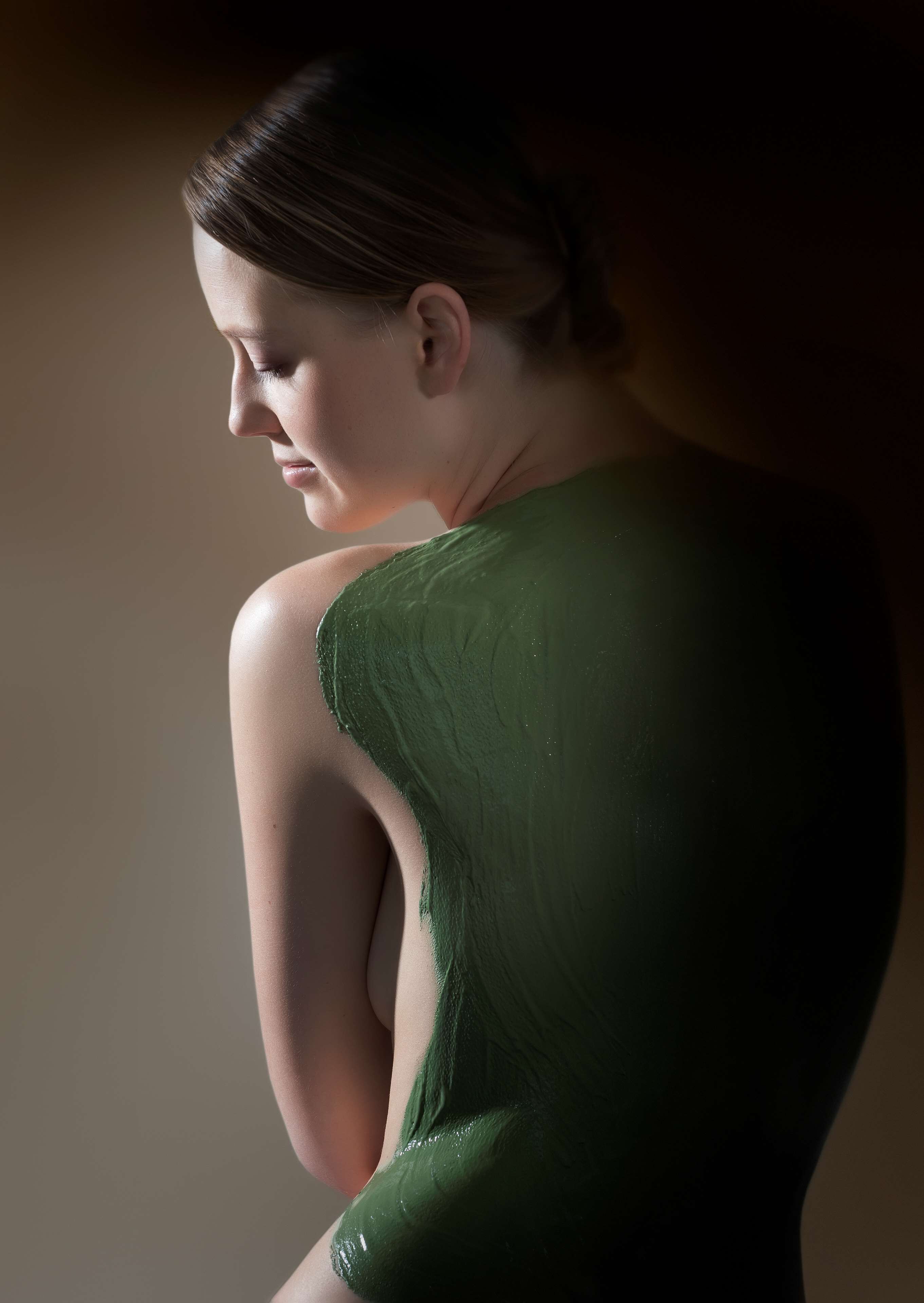 A person in a green dress.