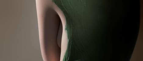 A person in a green dress.