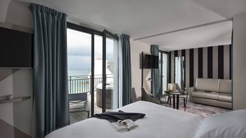 Suíte, banheira de imersão, vista para o mar | 1 quarto, roupas de cama premium, cofres nos quartos, escrivaninha