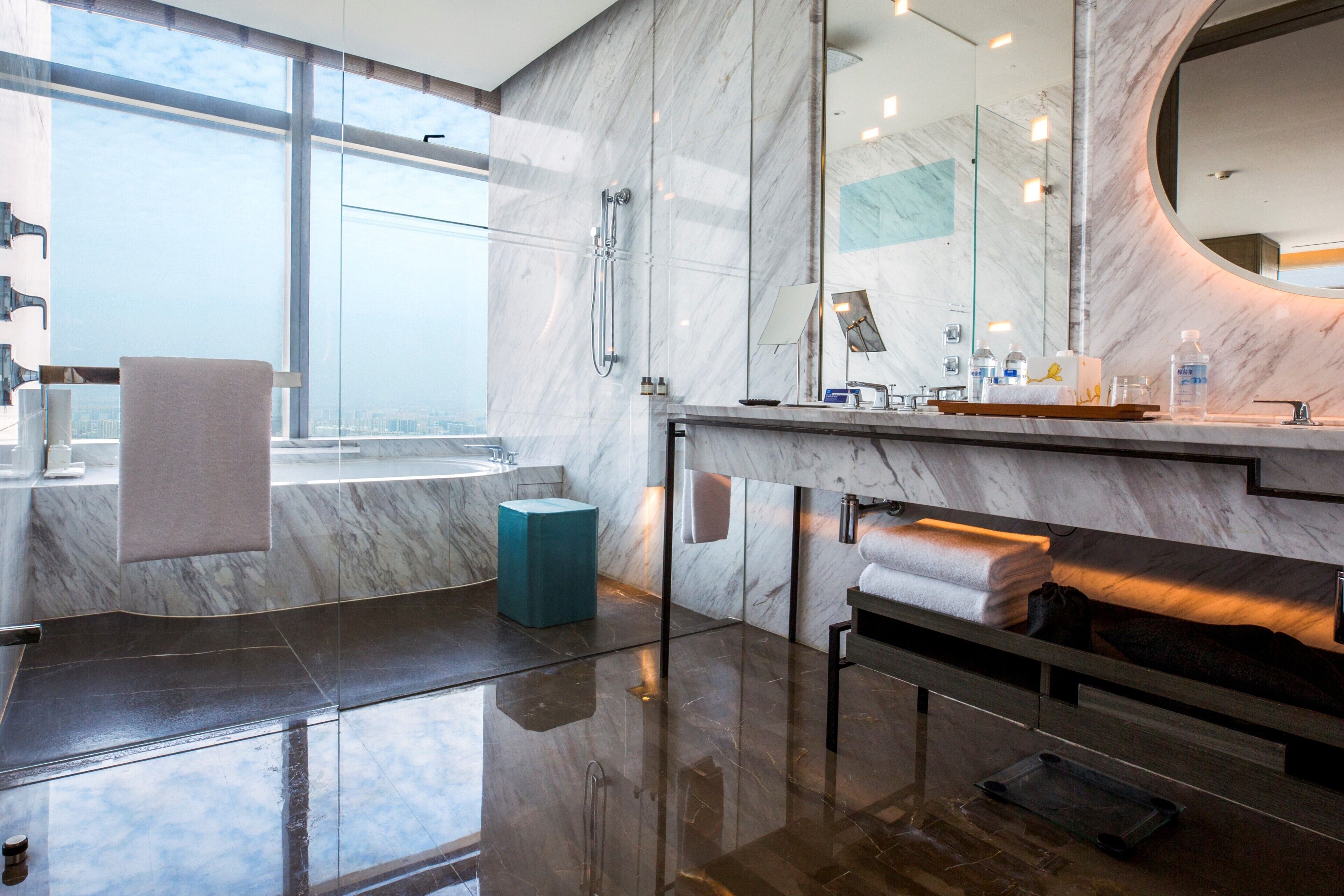 premium room, 1 king bed | bathroom | separate bathtub and shower, deep-soaking bathtub, designer toiletries