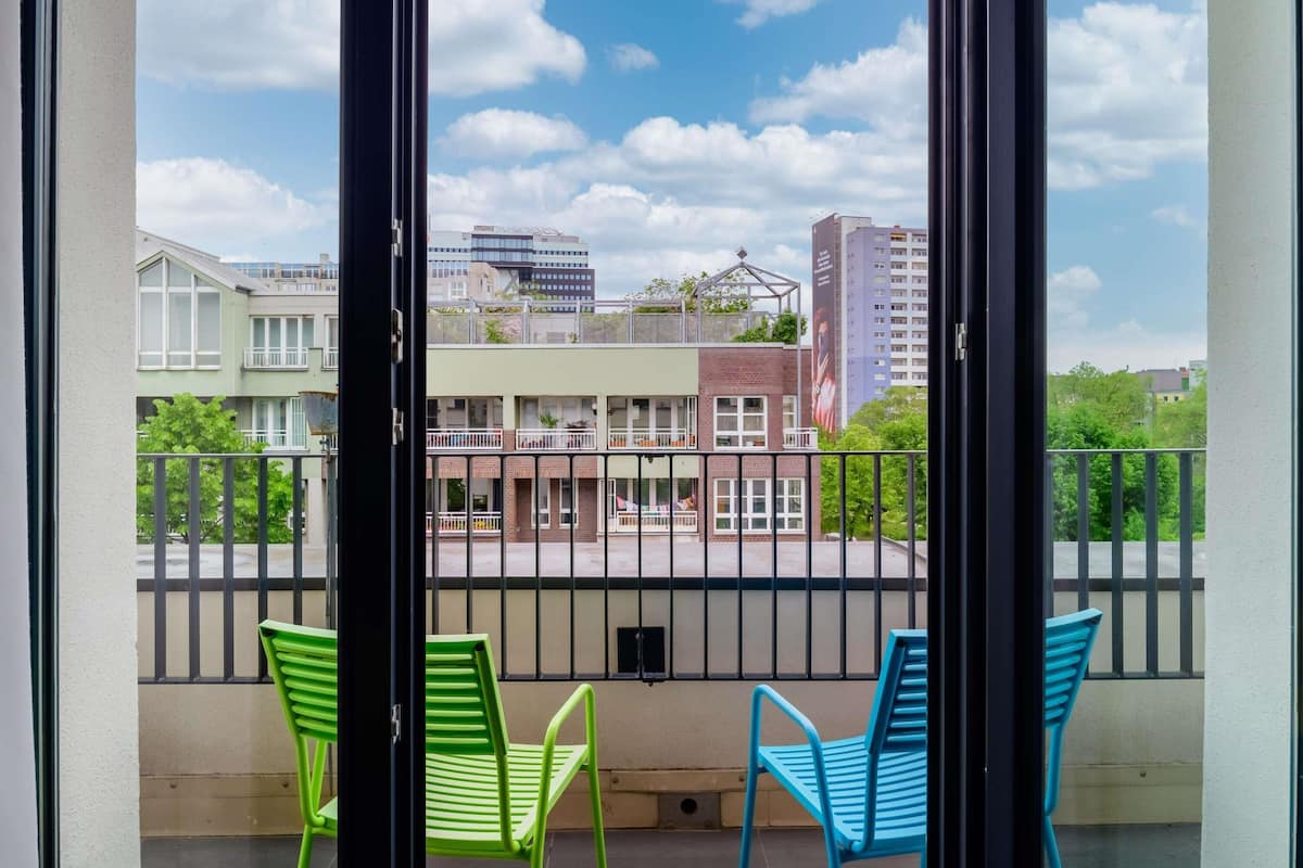 Habitación superior, 1 cama Queen size, balcón | Vista del balcón