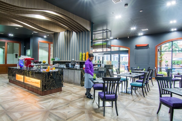 Daily buffet breakfast (USD 12 per person)