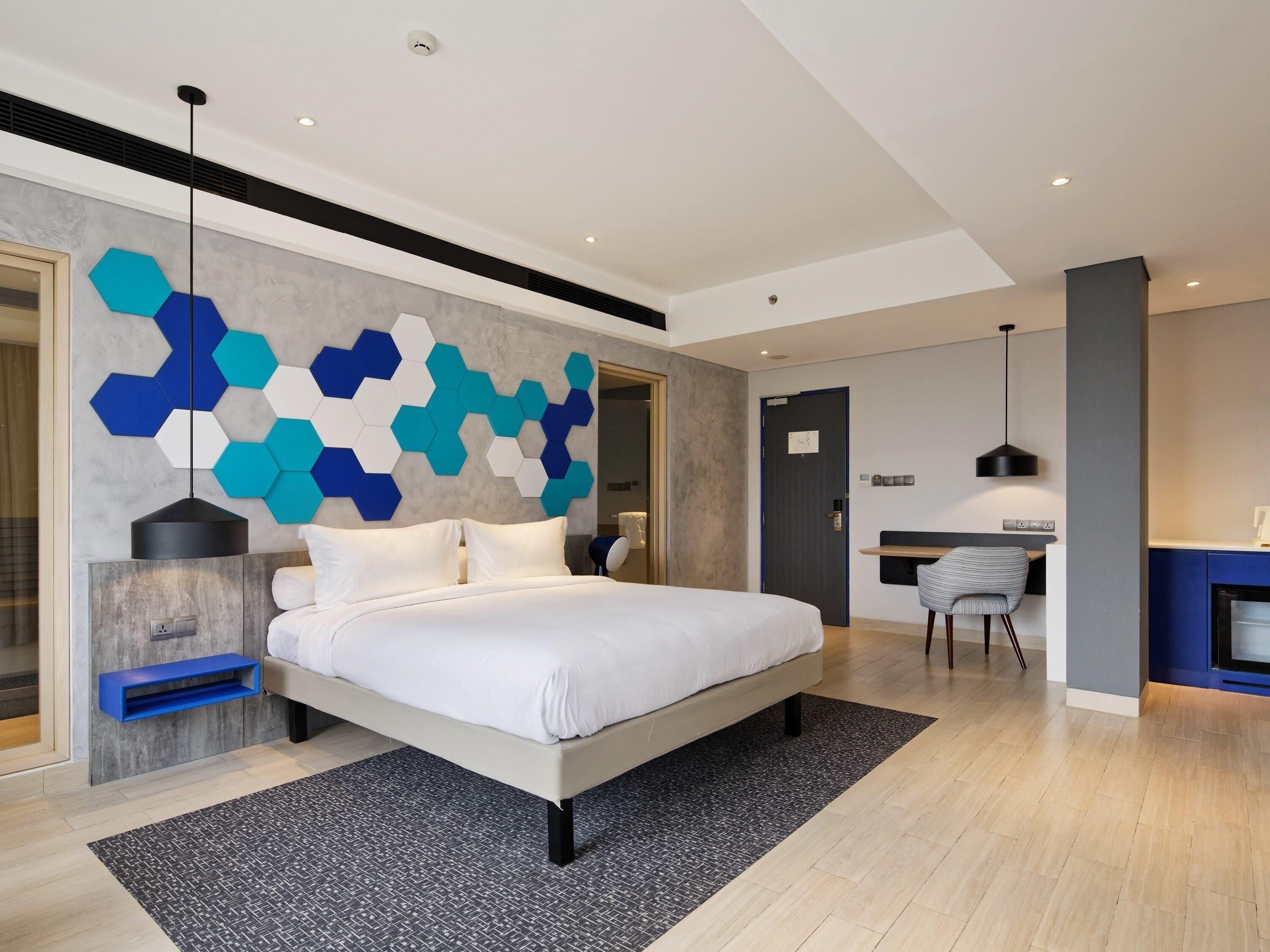 Suite – junior, 1 queensize-seng | Safe på rommet, skrivebord og ekstrasenger (mot et tillegg)