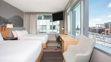 Premium bedding, pillow-top beds, desk, laptop workspace