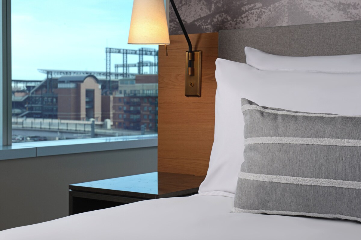 Premium bedding, pillow-top beds, desk, laptop workspace