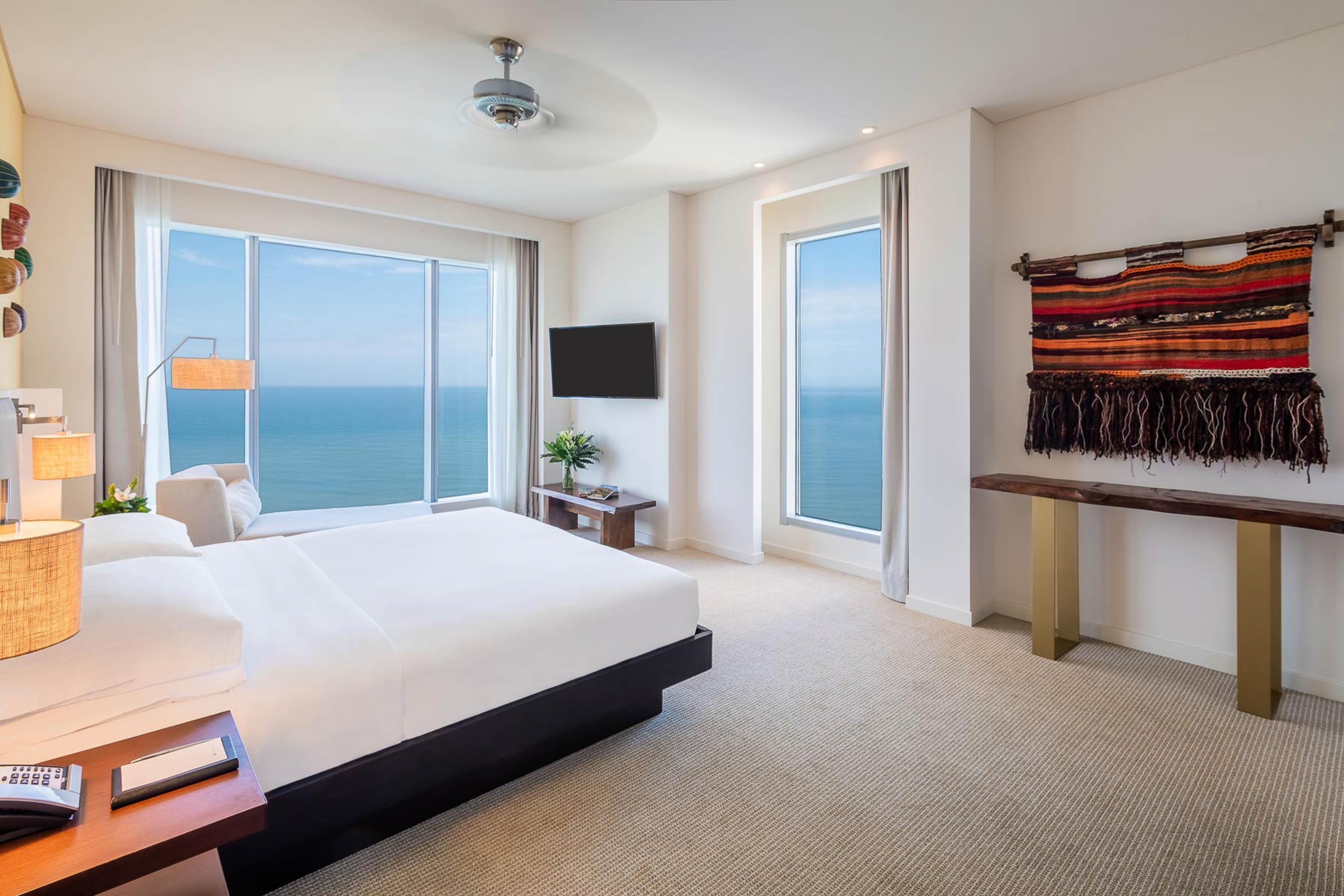 ジュニア スイート オーシャンビュー | エジプト綿のシーツ、低刺激性寝具、羽毛の掛け布団、低反発ベッド