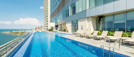 3 outdoor pools, open 8:00 AM to 8:00 PM, pool loungers